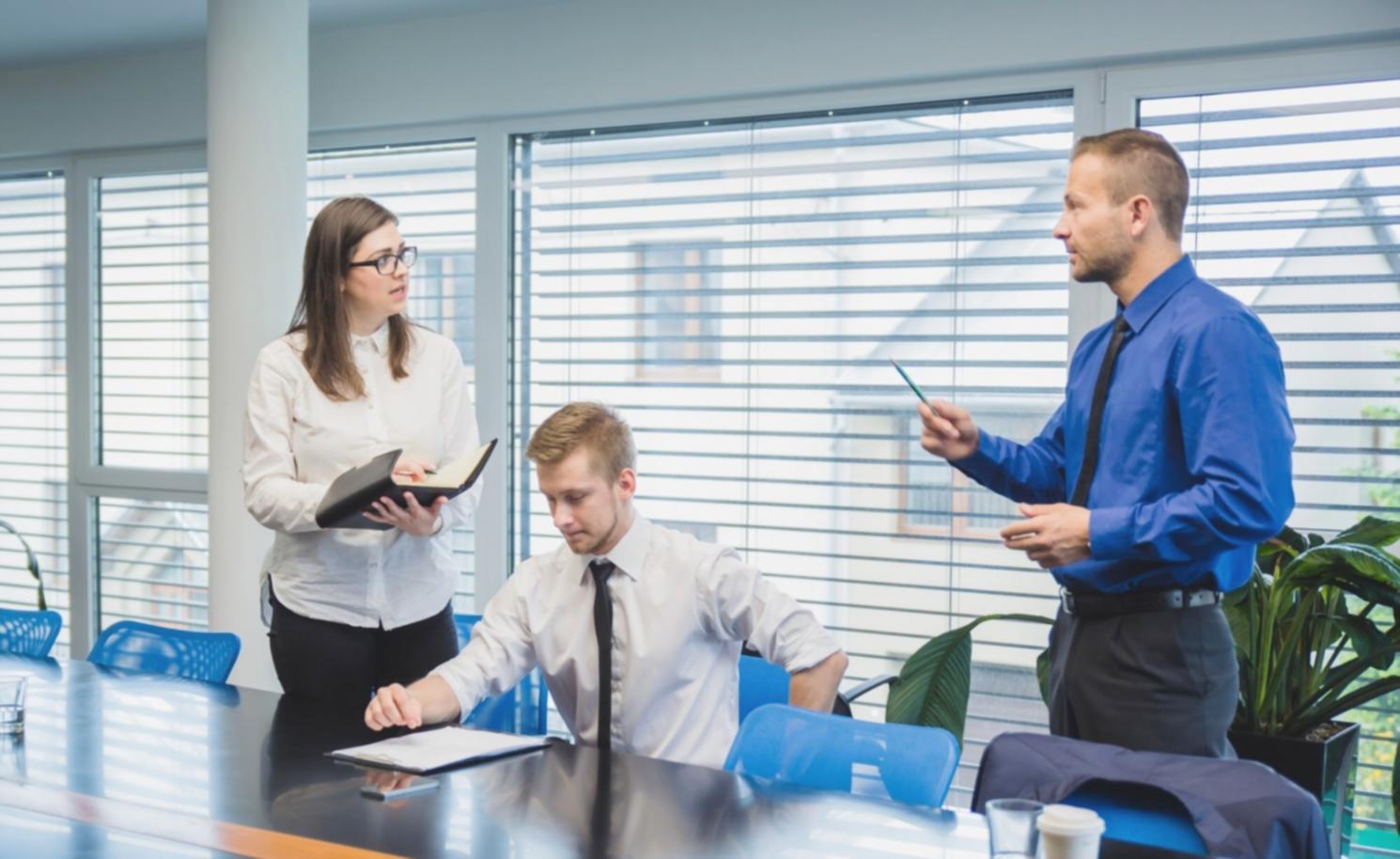 Motivated business professionals in training session